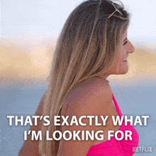 a woman in a pink bikini with the words that 's exactly what i 'm looking for