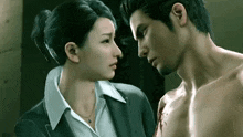 a man and a woman are looking at each other in a video game and kissing .