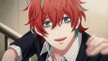 a boy with red hair and blue eyes is wearing a suit