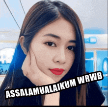 a woman with red lipstick and the words assalamualaikum wrwb written on her face