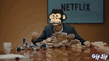 a cartoon of a man sitting at a table with a pile of money and the words here 's money go