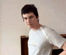 a man wearing a t-shirt that says core fusion