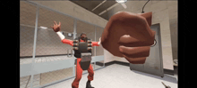 a video game character is being punched by a giant fist
