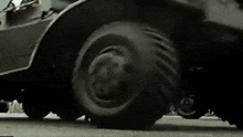 a close up of a vehicle 's wheels and tires