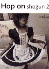 a girl in a maid costume is dancing in front of a sign that says hop on shogun 2 .