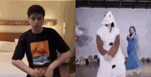 a man in a black shirt is standing next to a woman in a white chicken costume .