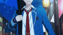 a boy in a blue school uniform is walking down the street