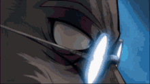 a close up of a person 's face with a pair of glasses on
