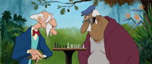 two old men are playing a game of chess in a park