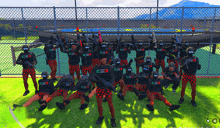a group of soldiers are posing for a picture with their arms in the air and their shirts saying tfsc