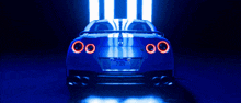 a blue sports car with a california license plate