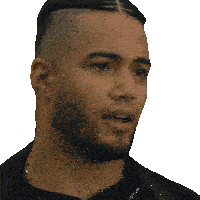 a close up of a man 's face with a beard and braids