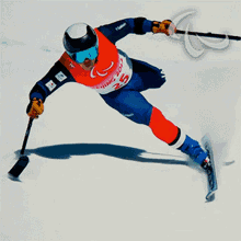sliding down para alpine skiing paralympics going down the snowy slope paralympic athlete