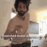 a man with a beard is dancing with the words " i watched andor and it 's good " written below him