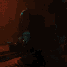 a woman in a green top is dancing in front of a neon sign that says hamburgers