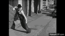 Laurel And Hardy Carry GIF - Laurel And Hardy Carry Heavy GIFs