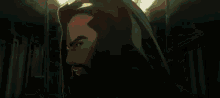 a man with long hair and a beard is standing in a train .
