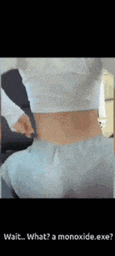a picture of a woman 's back with the caption wait what ? a monoxide.exe ..