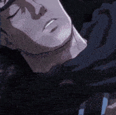 a close up of a man 's face with his eyes closed and a smile on his face