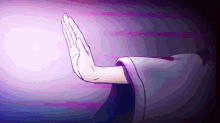 a person 's hand is shown with a purple background