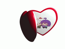 a heart shaped item with a picture of a girl and a boy on it