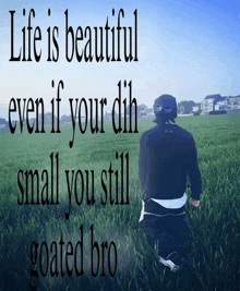 a picture of a man kneeling in a field with the words life is beautiful even if your dil small you still goated bro