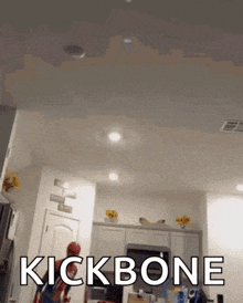a picture of a kitchen with the words kickbone written on the ceiling