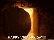 a picture of a tomb with the words he is risen happy victory day written above it