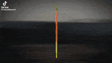 a tiktok video of a surfboard with a red white and yellow logo