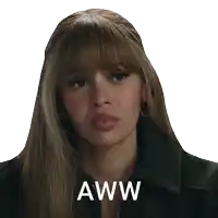 a woman is making a funny face with the words aww on her face