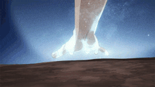 a person 's foot is glowing in the dark with a starry sky in the background