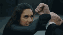 Resisting Michelle Khare GIF - Resisting Michelle Khare Holding Off GIFs