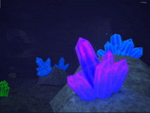 a computer screen shows purple and blue crystals in a dark cave