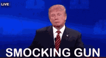 Smocking Gun Donald Trump GIF - Smocking Gun Donald Trump GIFs