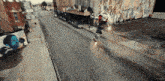 a person riding a skateboard down a street with the word kepler written on the bottom
