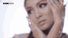a close up of a woman 's face with the words tvico outtakes at the bottom