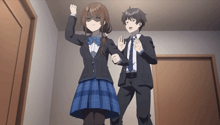 a man in a suit and a girl in a school uniform are dancing together