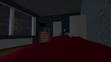 a bedroom with a red bed and a window