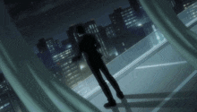 a man in a suit is standing on a balcony overlooking a city
