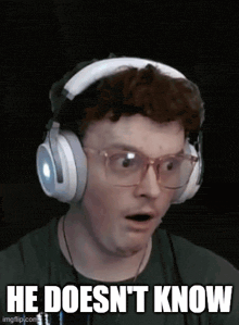 a man wearing headphones and glasses says he doesn t know