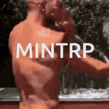 a blurred image of a man with the word mintrp written on it
