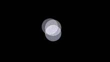 a blurred image of a square in the middle of a dark room