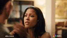 a man and a woman are having an argument and the nbc logo is visible in the corner