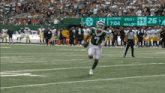 a football player with the number 7 on his jersey is running on the field