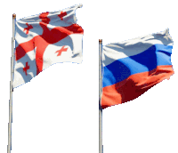a georgian and a russian flag are flying side by side