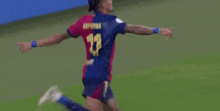 a soccer player with the number 11 on the back of his shirt