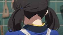 a close up of a woman 's neck and hair