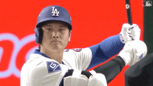 a baseball player with the letter a on his helmet