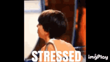 a gif of a person with the word stressed in the corner