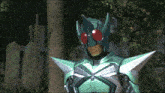 a man in a green and silver armor with red eyes